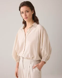 Blouse with bat sleeves