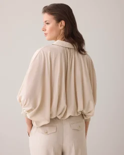 Blouse with bat sleeves