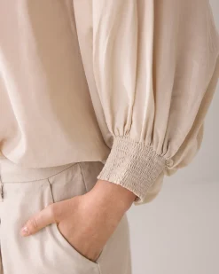 Blouse with bat sleeves