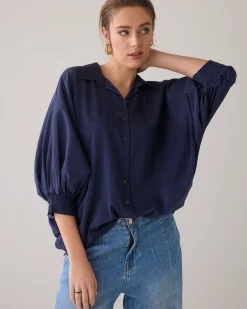 Blouse with bat sleeves
