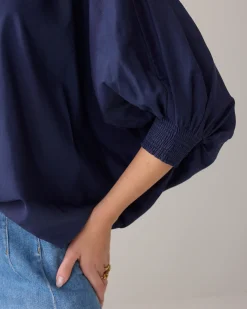 Blouse with bat sleeves