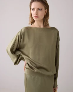 Top with batwing sleeves