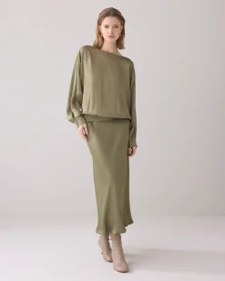 Top with batwing sleeves