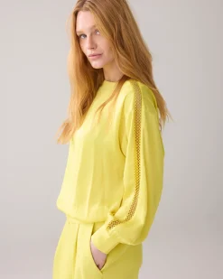 Top with batwing sleeves