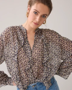 Top with petit-fleur ruffles