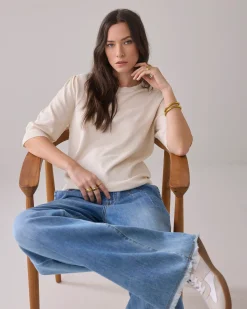 Top with puffed sleeves