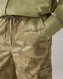 Trousers with camouflage print