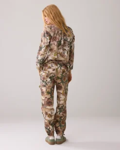 Trousers with camouflage and flower print