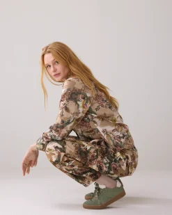 Trousers with camouflage and flower print