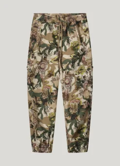 Trousers with camouflage and flower print