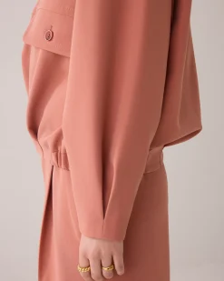 Trousers with pleated waistband