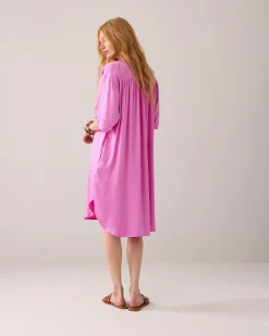 Tunic dress with button fastening